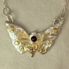 Silver and gold Thames butterfly with Garnet
