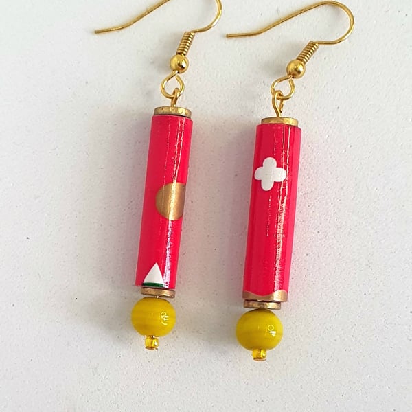 Long red paper beaded earrings with yellow bottom bead