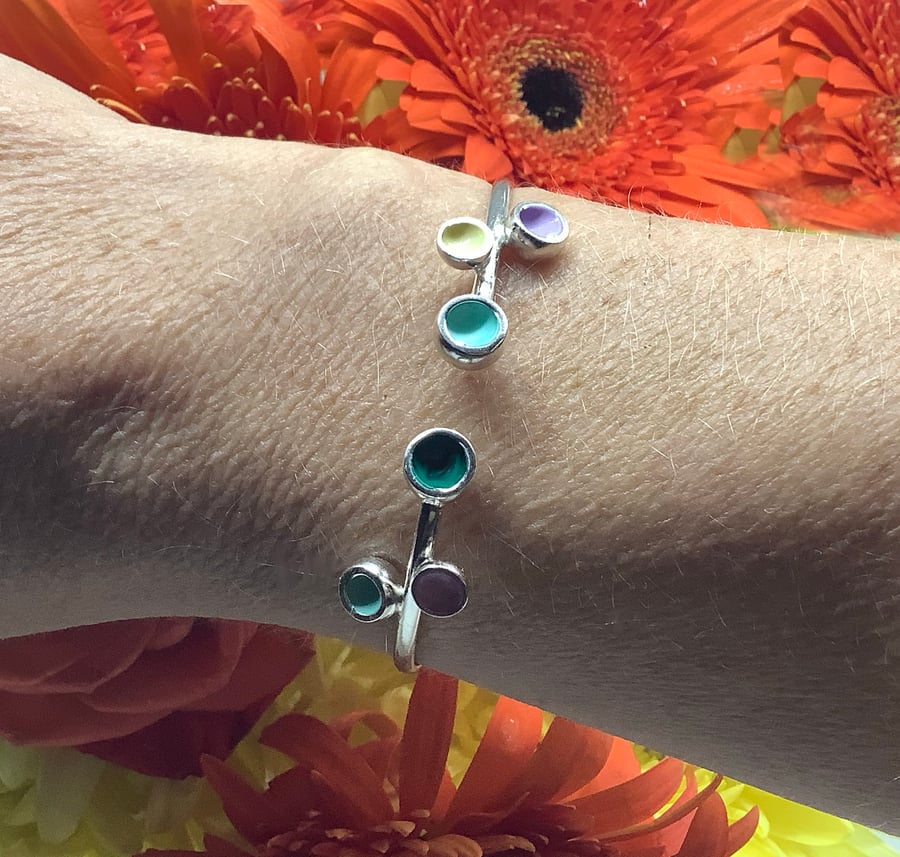 Sterling silver with emerald, pale teal, yellow, pink & lilac adjustable bangle