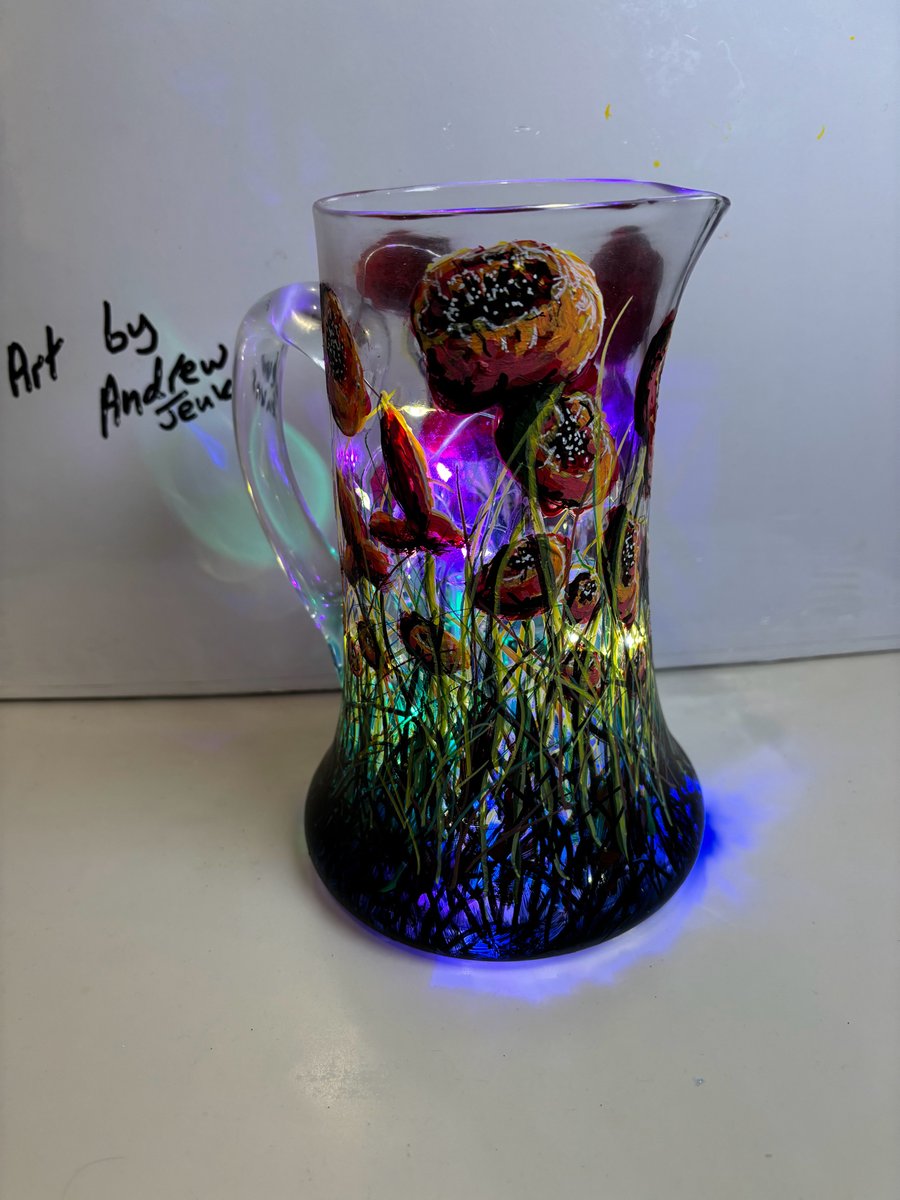 A hand painted and fired high quality glass pitcher by Andrew Jenkins 