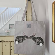 Tote bag with machine stitched printed rabbit & fluffy pompom tails - light grey