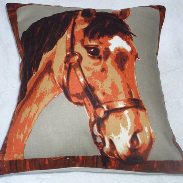 A beautiful brown horse looking over a stable door cushion 