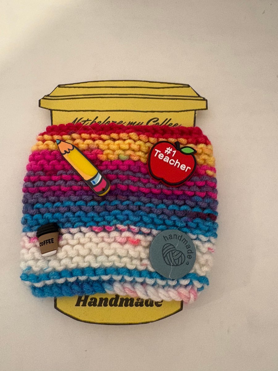 Teacher knitted cup cosy. 