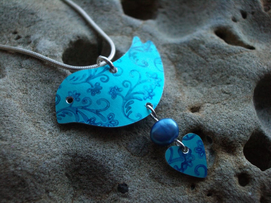 Blue bird with flowers and heart