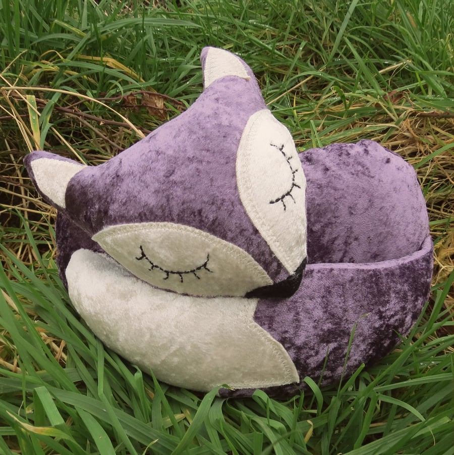 Velvet Fox.  A snoozy fox doorstop.  Lilac Fox.  