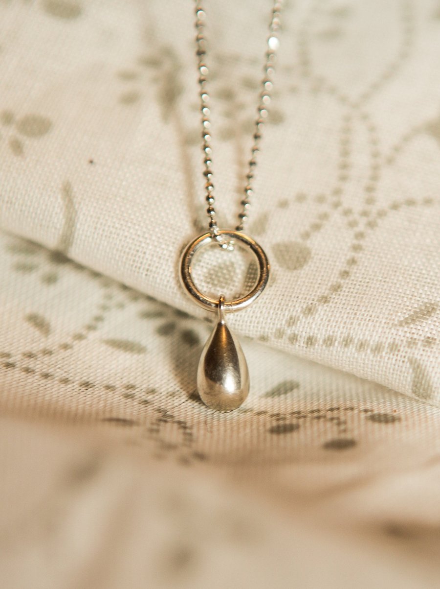 Sterling silver tear drop hoop pendant on a diamond cut ball chain