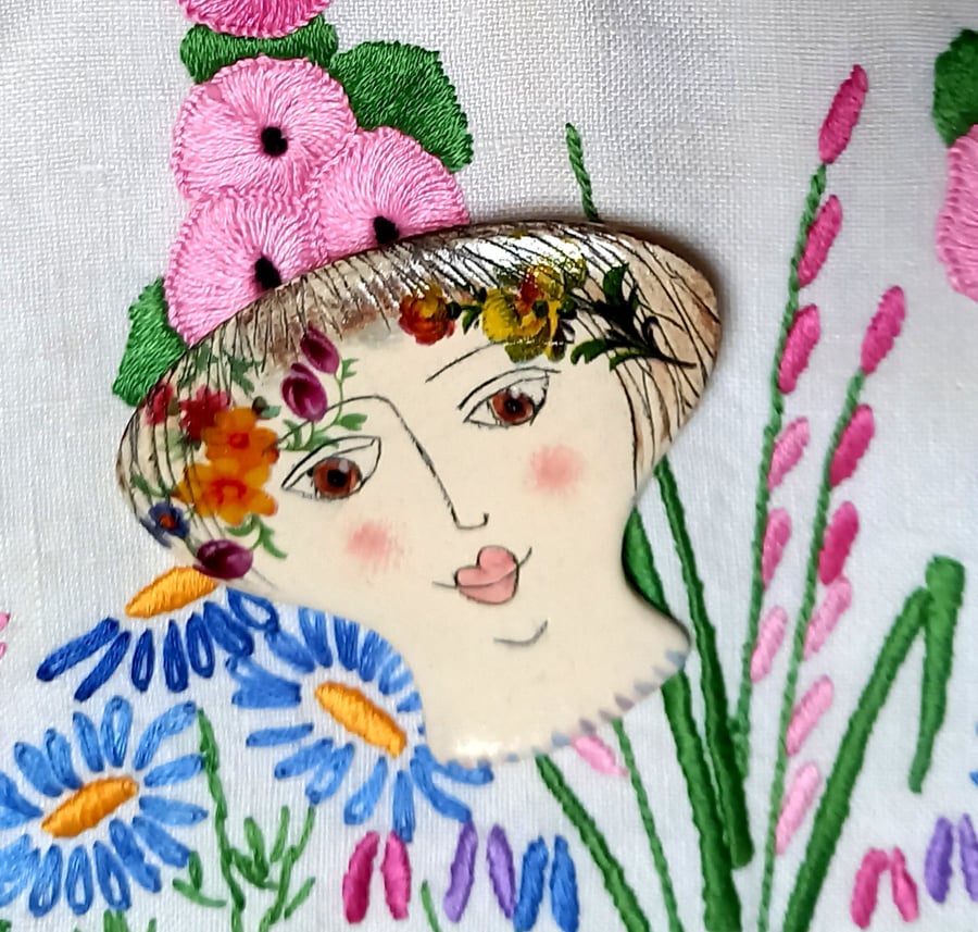 Lady face brooches 