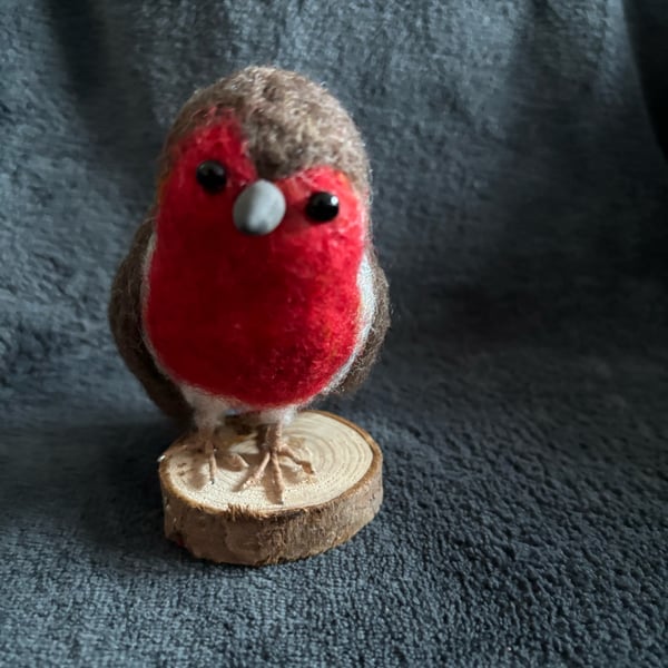 Needle felted blue tit on wood slice