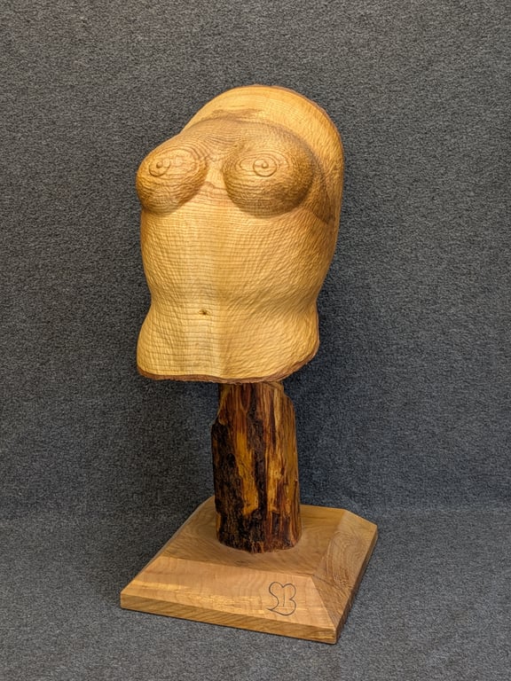 Hand carved wooden women torso 