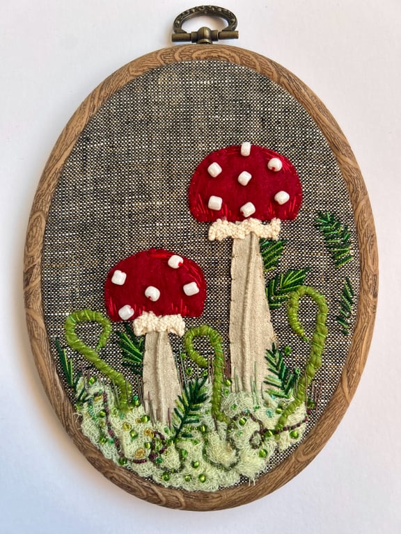 Framed embroidery. Red toadstool woodland