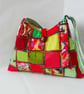 Pyramid shaped shoulder bag in red and green - Image 1