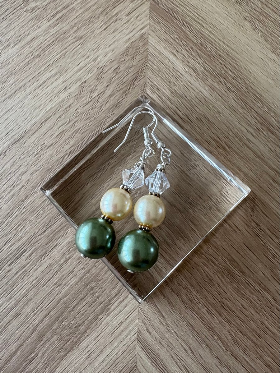 Striking green and cream earrings 