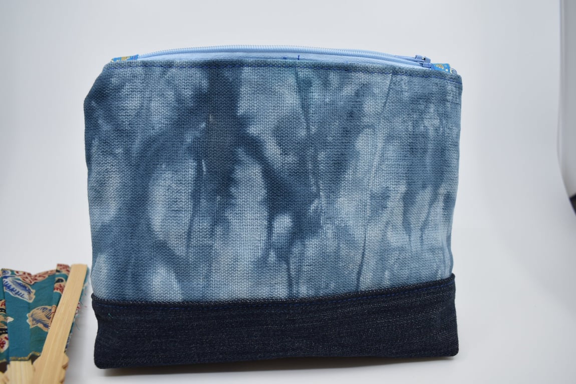 Handy zipped storage pouch for many necessary smaller items. For bag or bedroom.