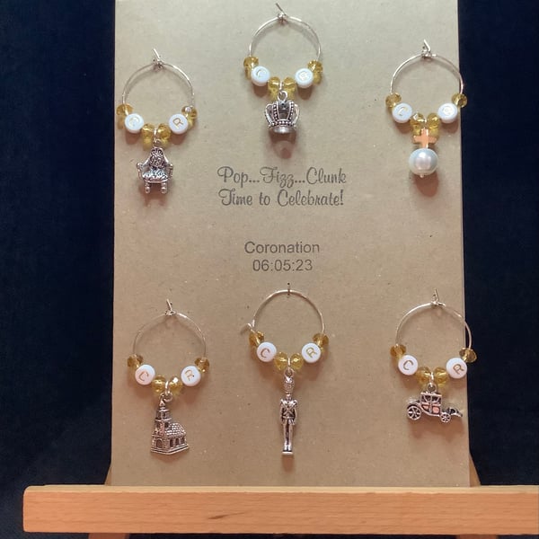 Handmade wine glass charms for the Coronation of King Charles III. 