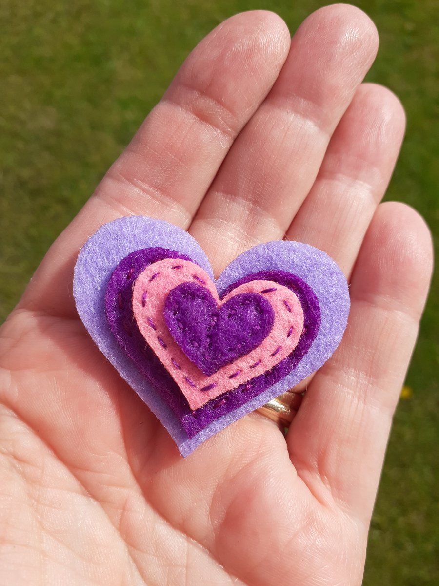 Heart shaped fridge magnet in purple and pink colours