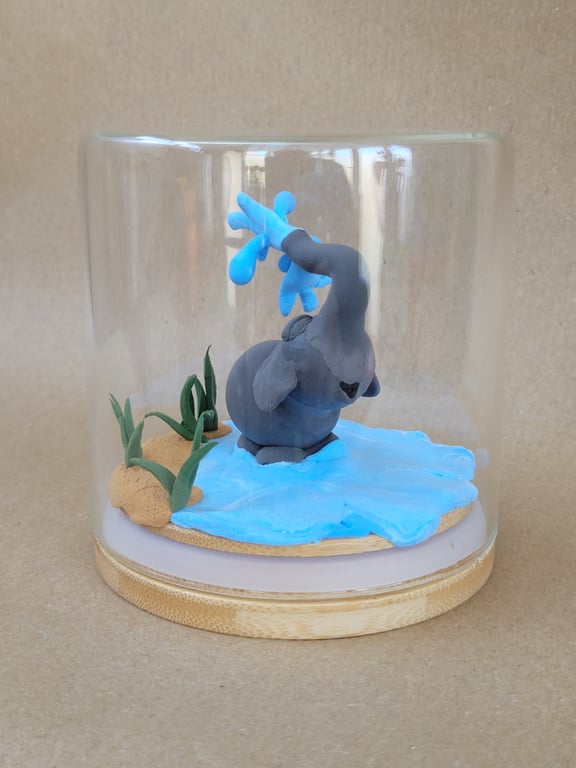 Splish Splash, handmade ornamental Elephant in a glass jar