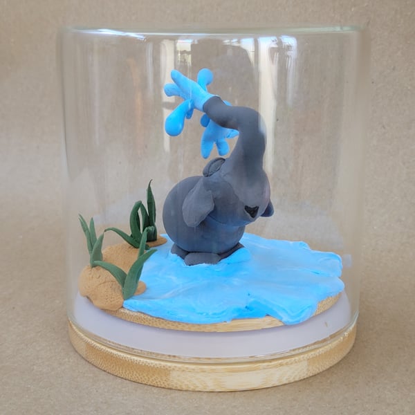 Splish Splash, handmade ornamental Elephant in a glass jar