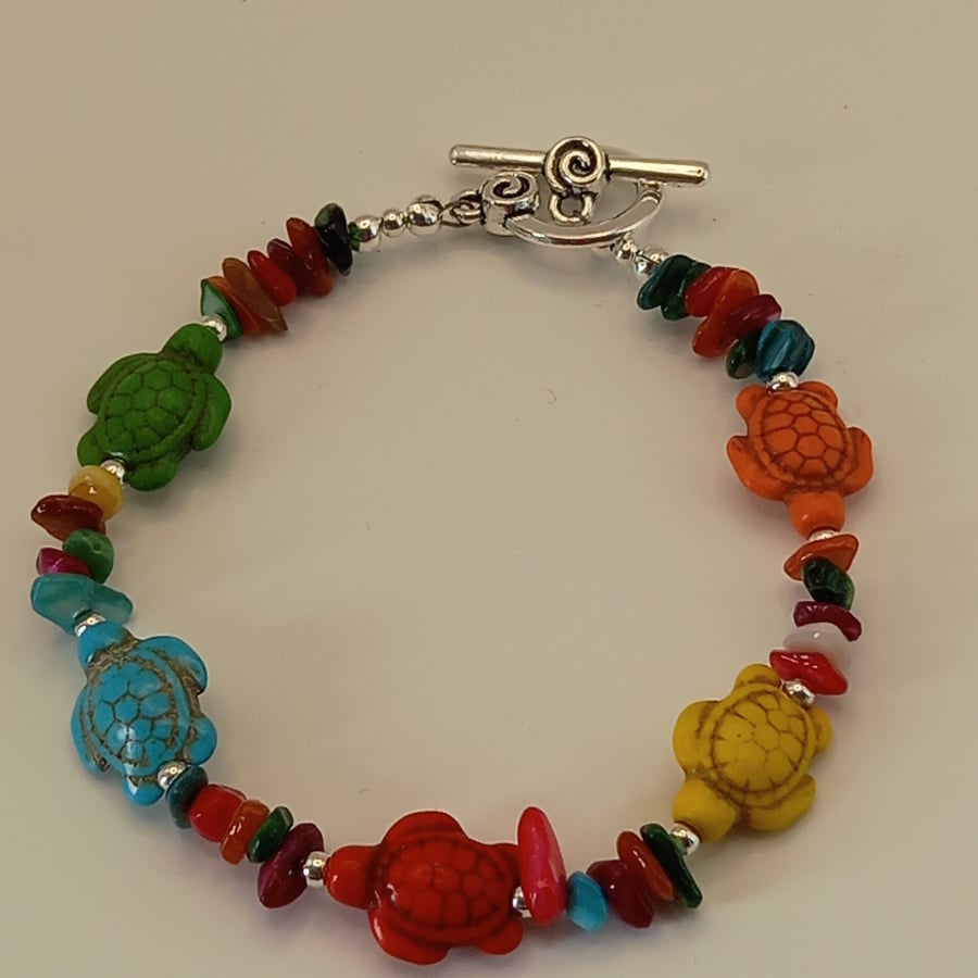 Colourful turtles and shell bracelet
