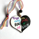 Things are rarely just black or just white hand painted heart 