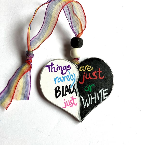 Things are rarely just black or just white hand painted heart 