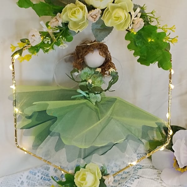 spring Fairy doll on hoop with fairy lights and yellow flowers