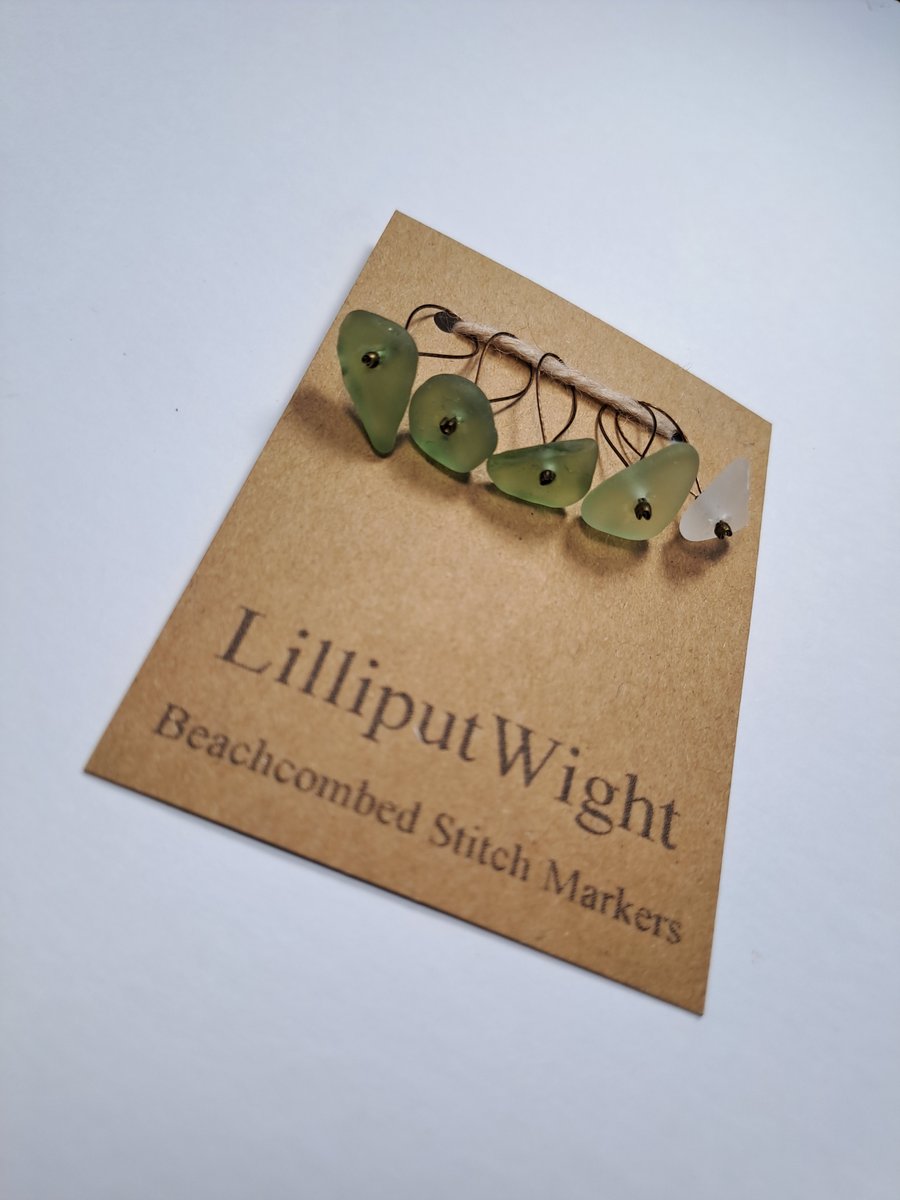 Five clear and green sea glass stitch markers