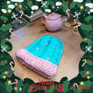 Hand knit teal blue and pink wool hat