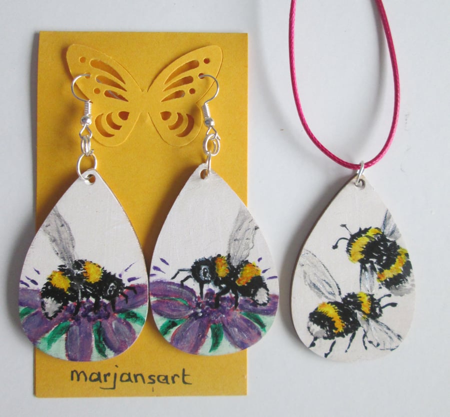 Bumblebee and purple flower earrings and pendant set.
