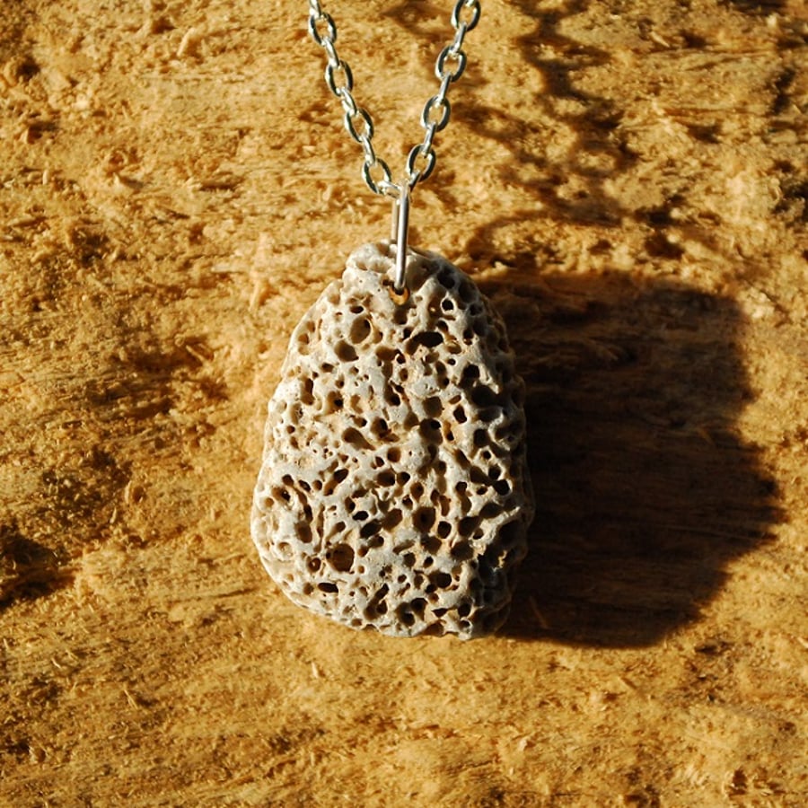 Marine boring creature pebble pendant