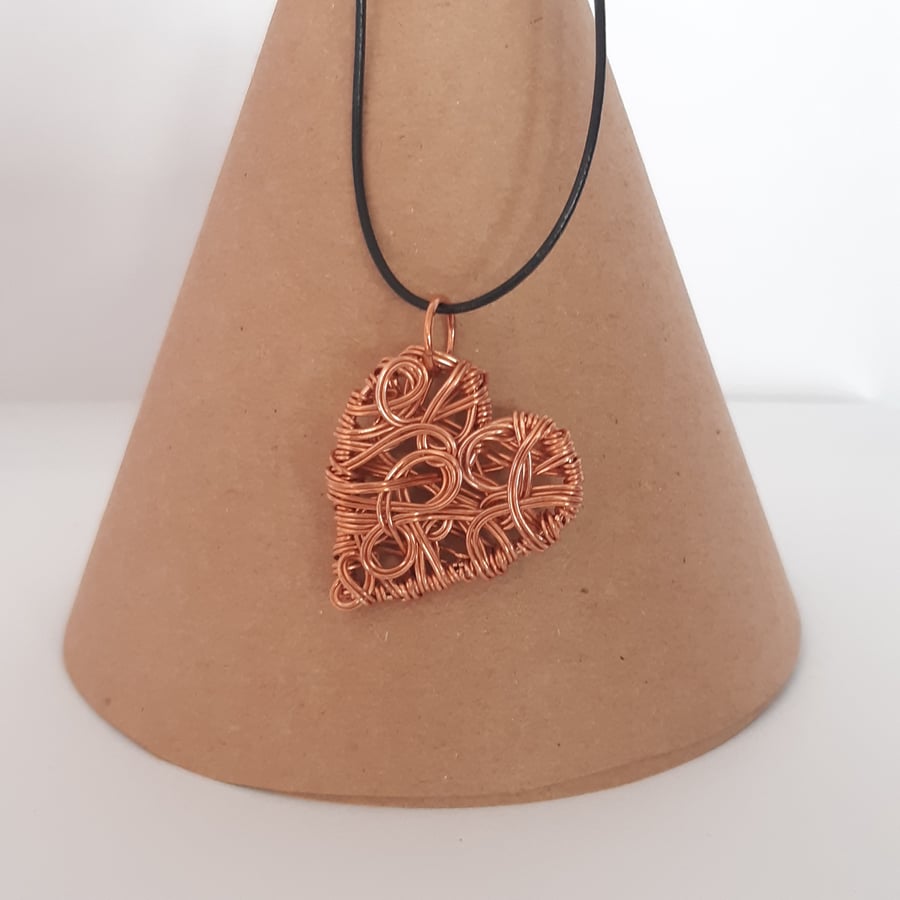 Copper free form heart shaped pendant
