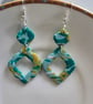 Polymer clay dangle green and gold earrings on silver plated earhooks