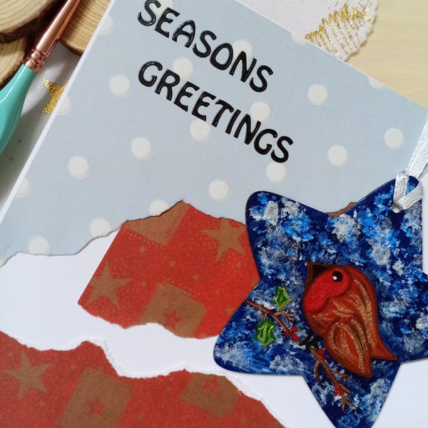 Christmas card with a wooden robin decoration