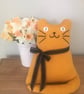 Yellow mustard cat doll 