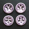 Set of four little handmade ceramic buttons purple flowers