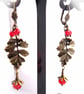 Holly Leaf And Red Crystal Berry Earrings in Antiqued Bronze - Image 1
