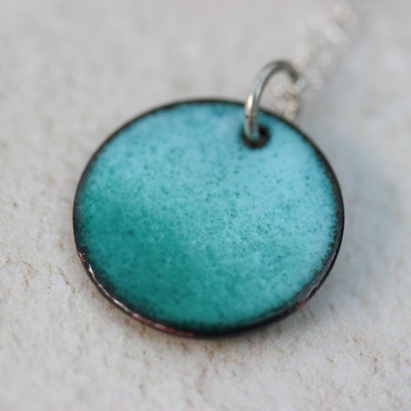 Turquoise blue enamel circle pendant