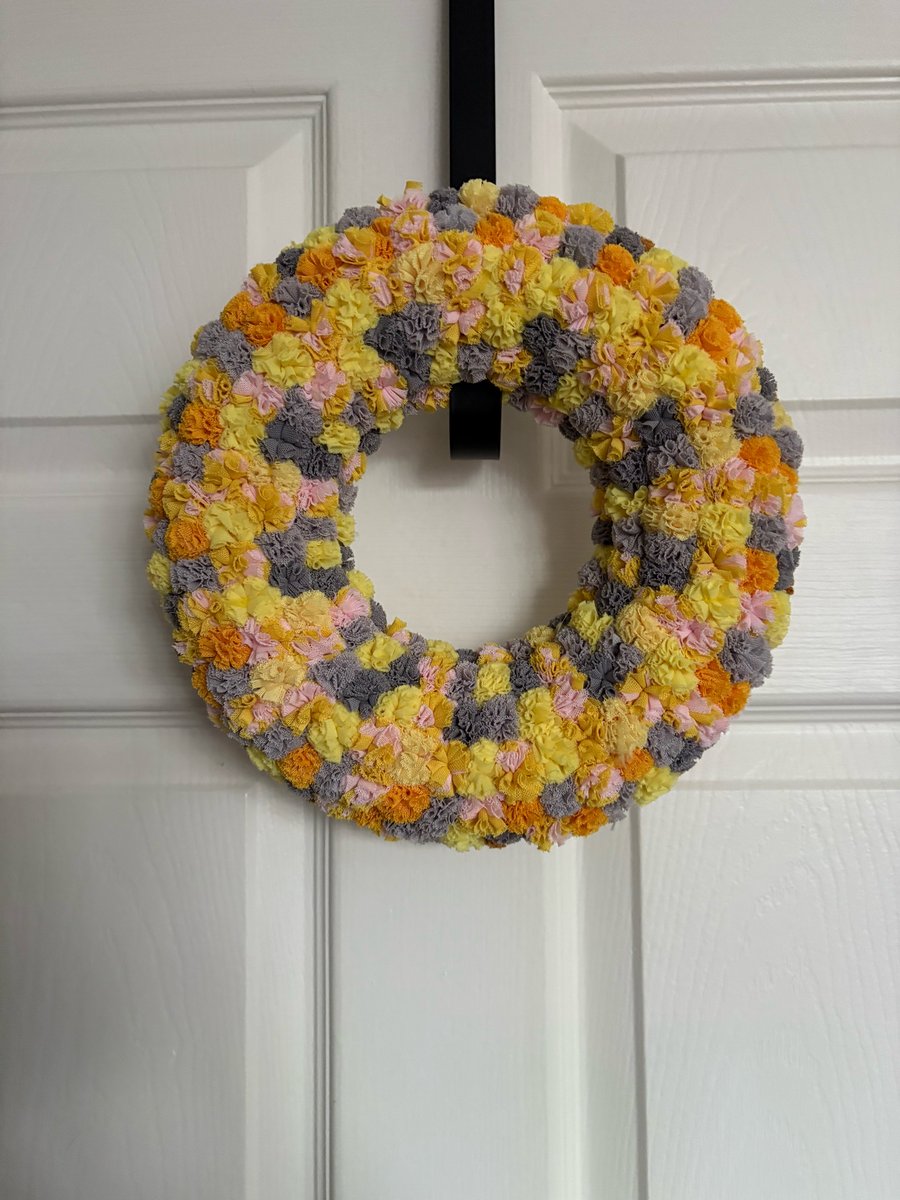 Mellow yellow scrunchy Pom Pom wreath. 
