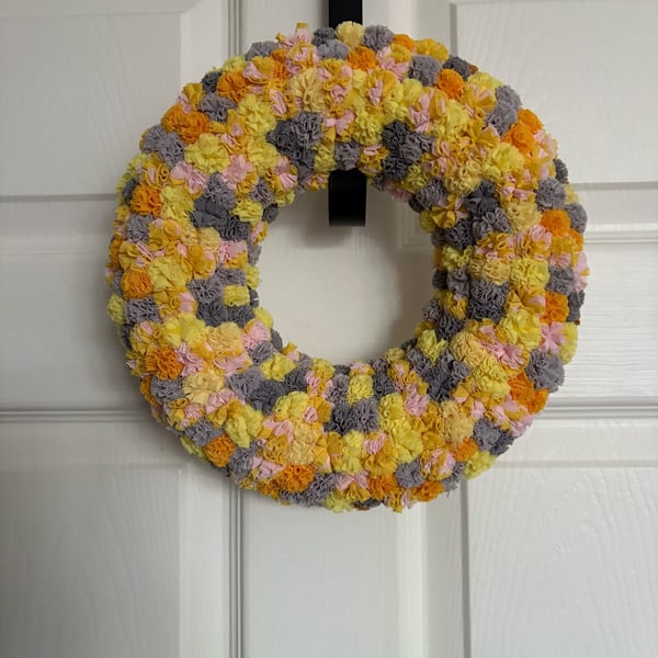 Mellow yellow scrunchy Pom Pom wreath. 