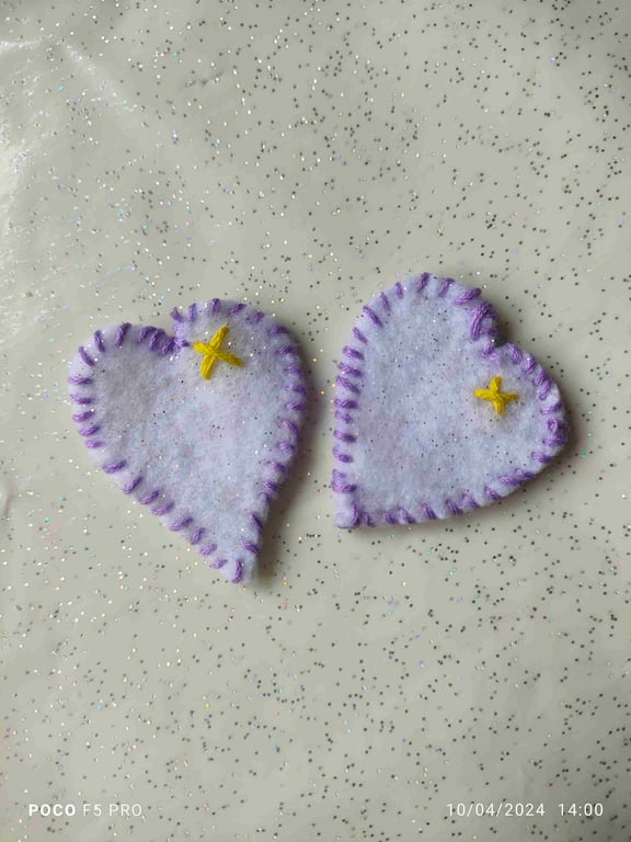 Handmade heart shaped felt pocket hugs