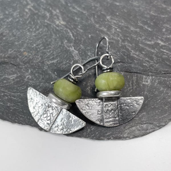Silver and green opal tribal blade earrings.