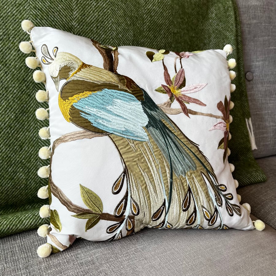 Embroidered bird cushion deals