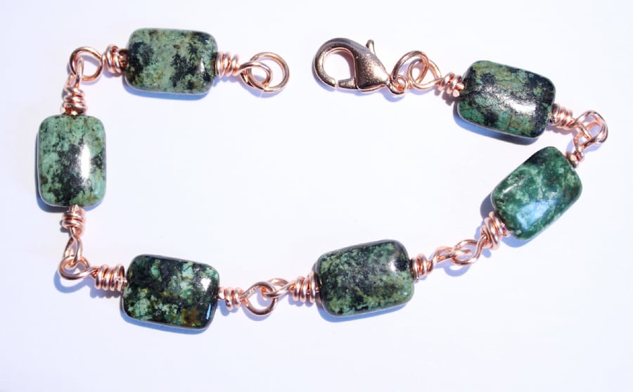 Green and black african turquoise and copper wire wrap bracelet