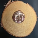 Hand sculpted moon face pendant