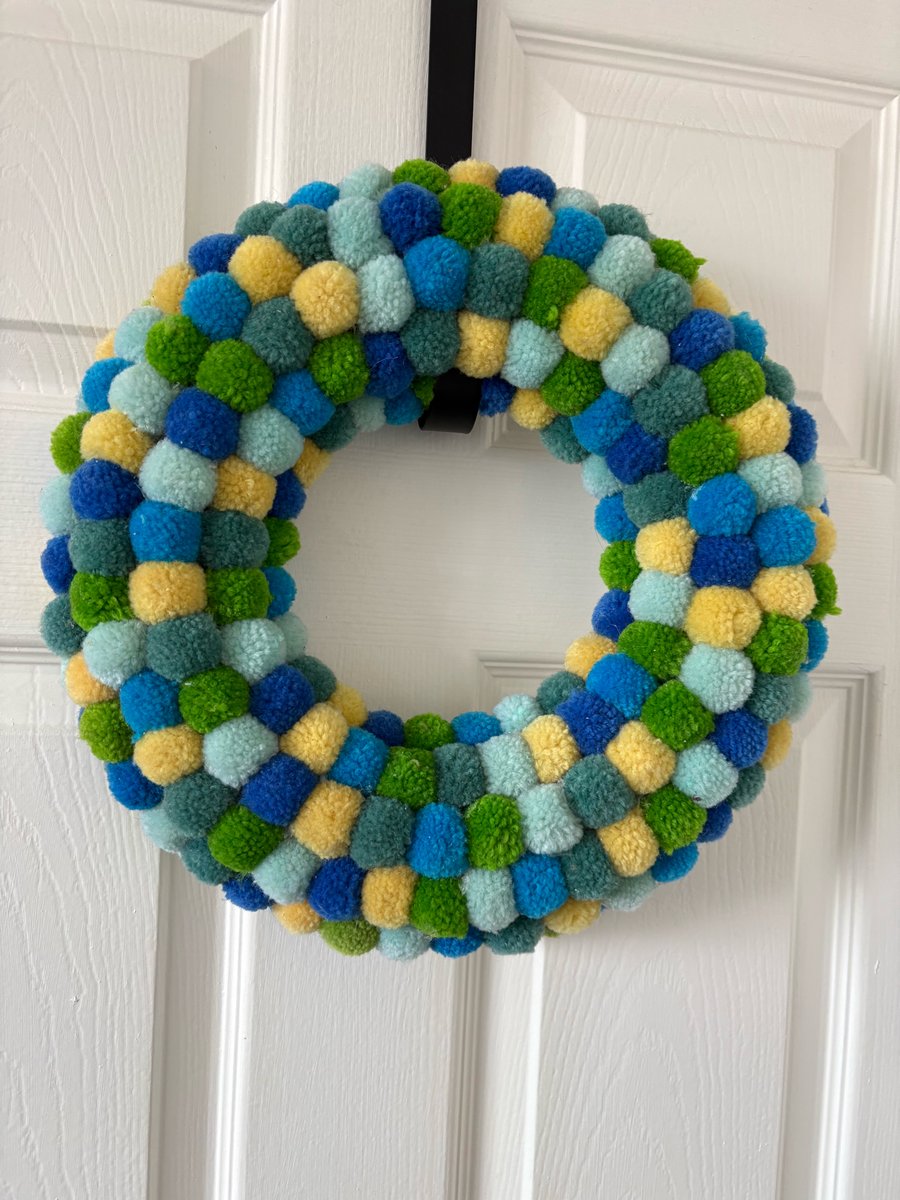 Blues and lemons wool Pom Pom wreath. 