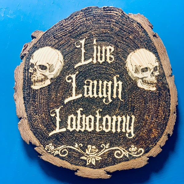 Live, laugh, lobotomy sign, wall hanging.