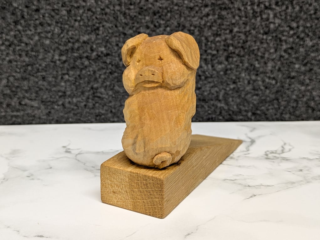 Hand carved wooden piglet 