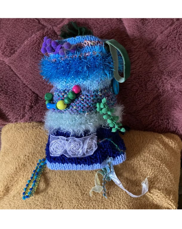 Blue twiddle mitt multi sensory aid