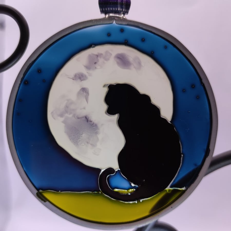 Handmade glass painted window hanging or Christmas tree bauble