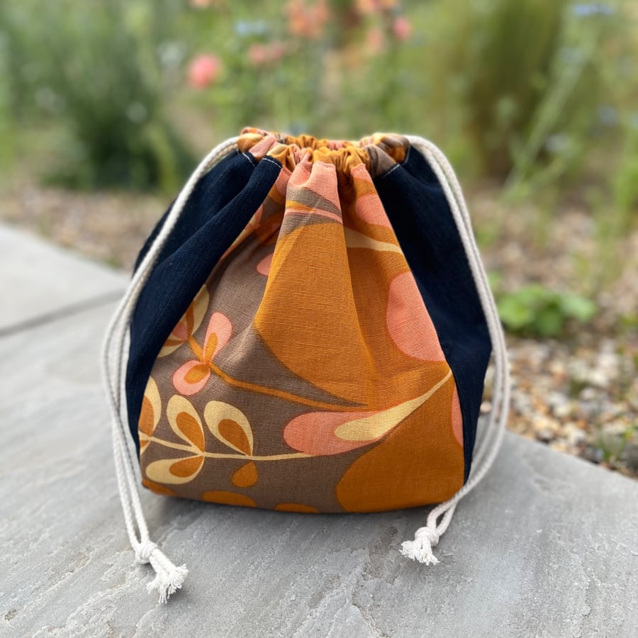 Dumpling drawstring bag - reclaimed vintage orange curtain fabric and denim 