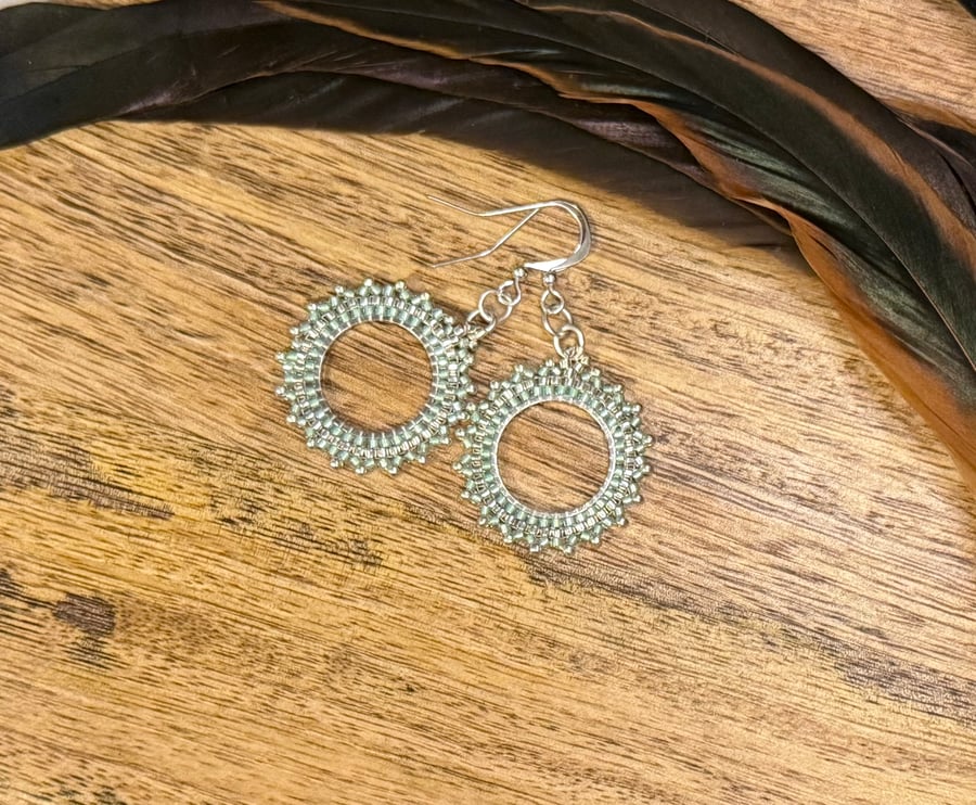 Beadwork hoop earrings in pale green and silver